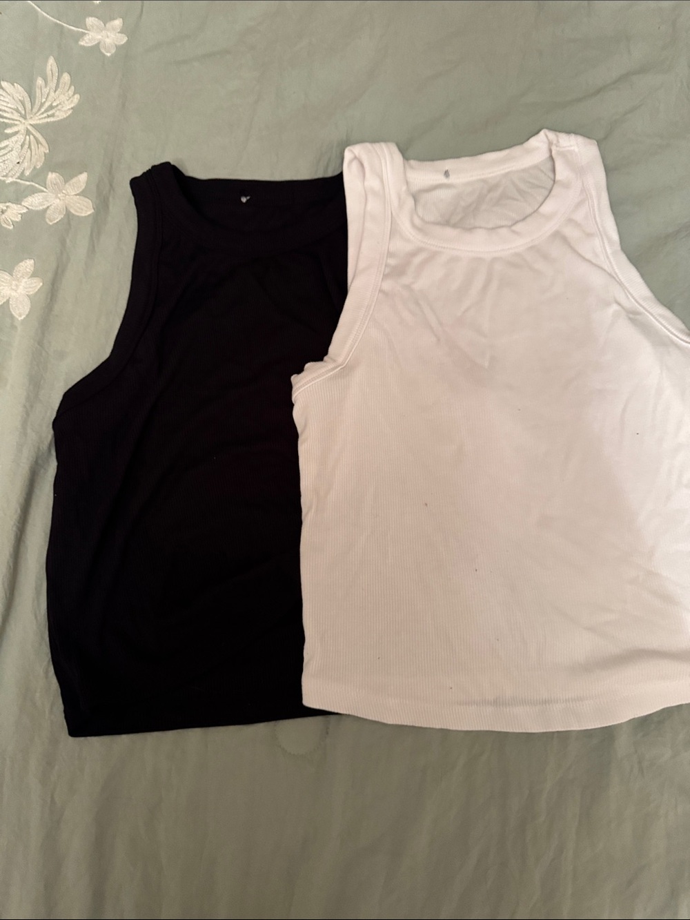 Women’s cropped black and white tanks